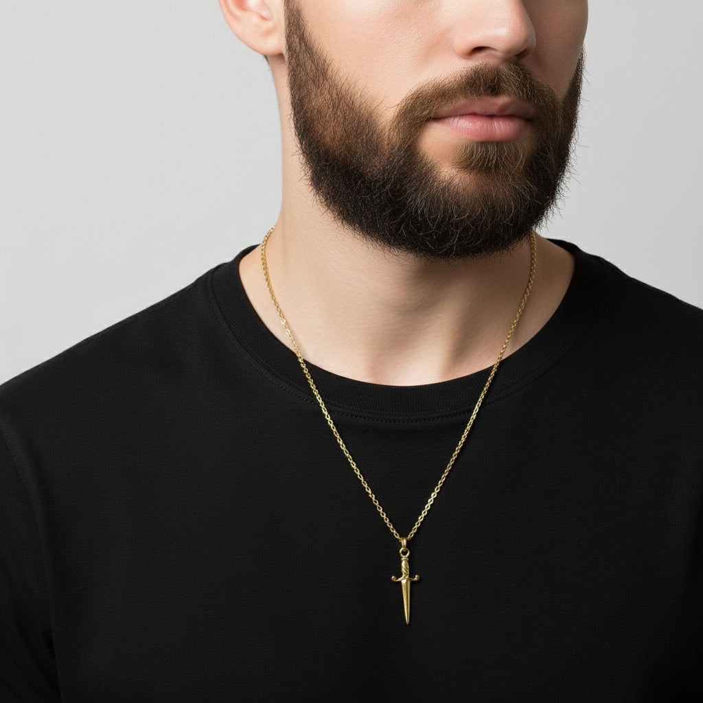 Gold sword-shaped pendant on a chain