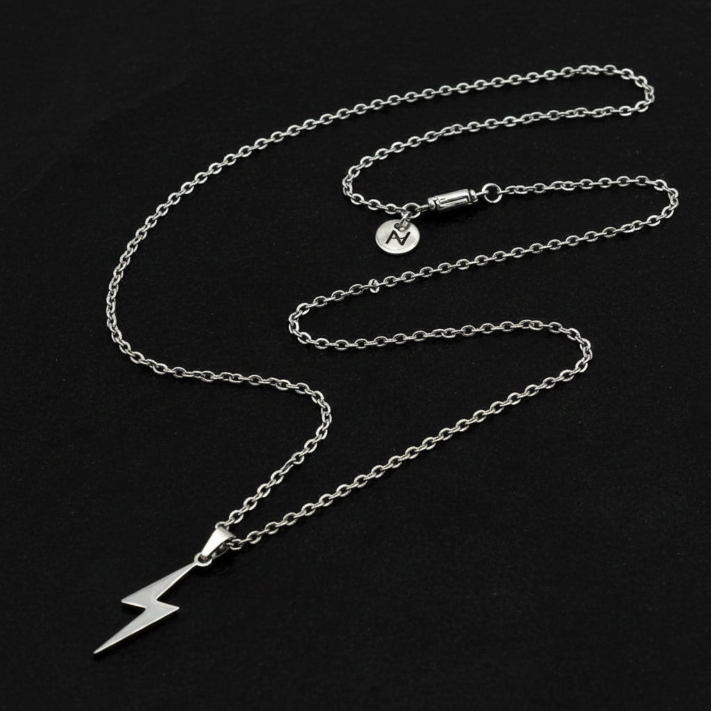 Silver necklace with a lightning bolt pendant