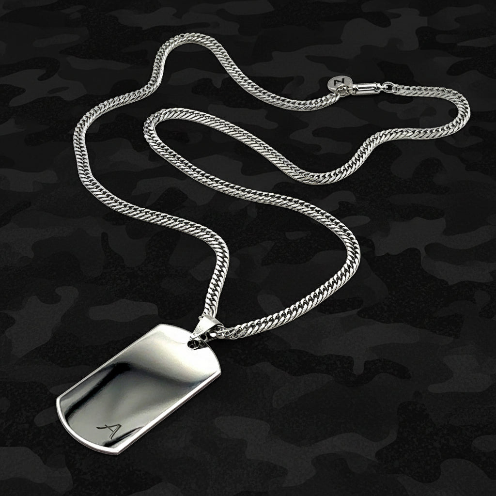 Silver chain necklace with a dog tag
