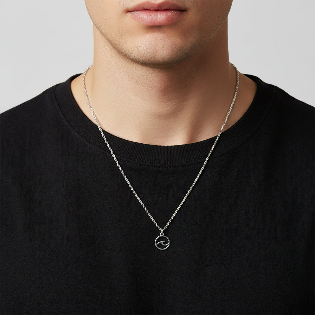 Silver necklace with a wave pendant